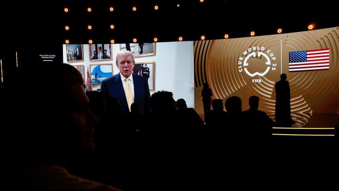 MIAMI, FLORIDA - DECEMBER 05: A video message from President-elect Donald Trump is shown on the screen during the 2025 FIFA Club World Cup Draw at Telemundo Studios on December 05, 2024 in Miami, Florida.  (Photo by Eva Marie Uzcategui - FIFA/FIFA via Getty Images)