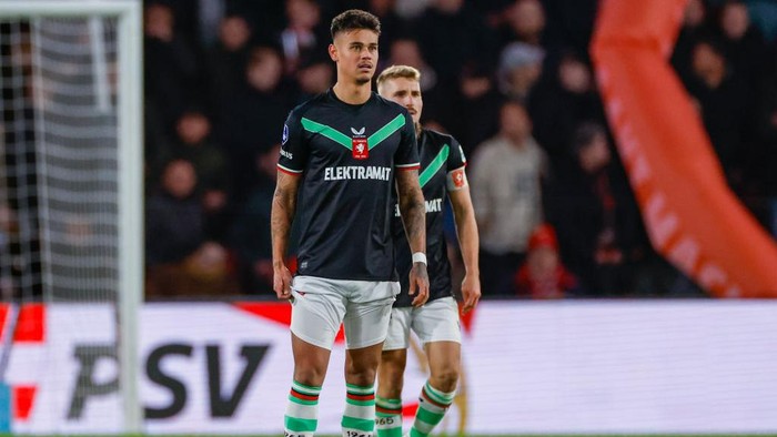 Eindhoven, Netherlands - December 6: Mees Hilgers of FC Twente disappointed during the Eredivisie match between PSV Eindhoven and FC Twente 65 at Philips Stadium on December 6, 2024 in Eindhoven, Netherlands. (Photo by Marcel ter Bals/DeFodi Images/DeFodi via Getty Images)