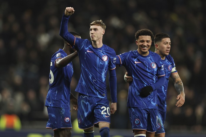 Chelseas Cole Palmer celebrates after scoring his sides fourth goal during the English Premier League soccer match between Tottenham Chelsea, at the Hotspur stadium in London, Sunday, Dec.8, 2024. (AP Photo/Ian Walton)