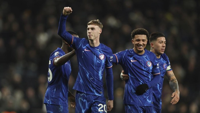 Chelseas Cole Palmer celebrates after scoring his sides fourth goal during the English Premier League soccer match between Tottenham Chelsea, at the Hotspur stadium in London, Sunday, Dec.8, 2024. (AP Photo/Ian Walton)
