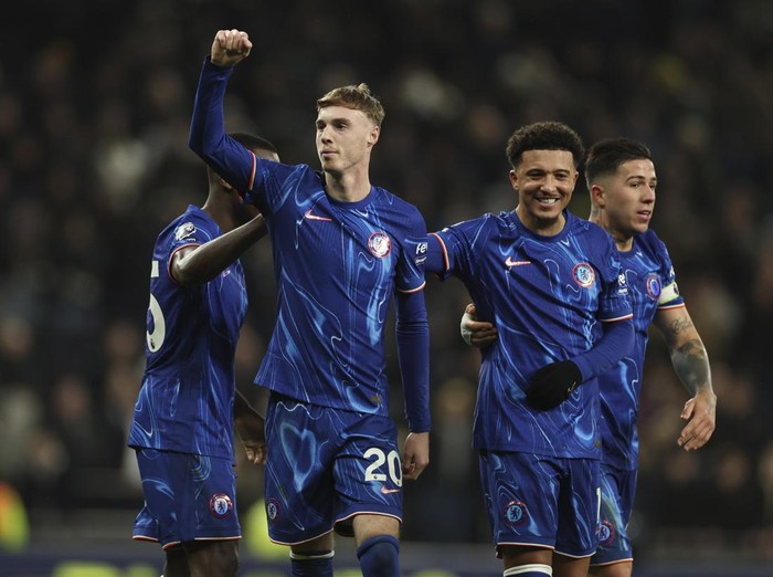 Chelsea's Cole Palmer celebrates after scoring his side's fourth goal during the English Premier League soccer match between Tottenham Chelsea, at the Hotspur stadium in London, Sunday, Dec.8, 2024. (AP Photo/Ian Walton)