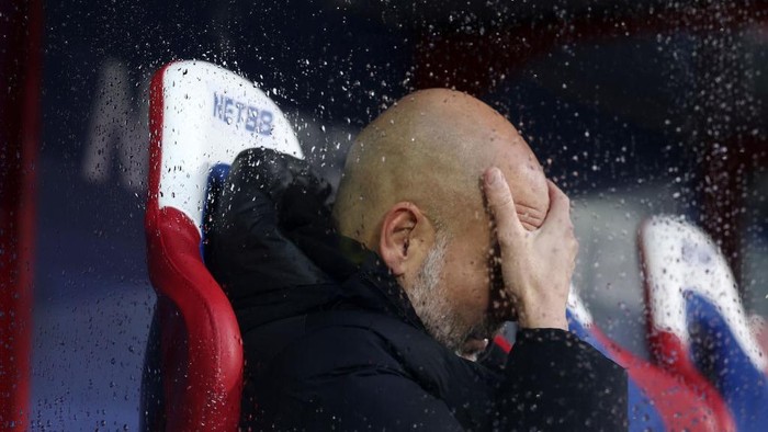LONDON, ENGLAND - DECEMBER 07: Pep Guardiola, Manager of Manchester City, reacts prior to the Premier League match between Crystal Palace FC and Manchester City FC at Selhurst Park on December 07, 2024 in London, England. (Photo by Ryan Pierse/Getty Images)