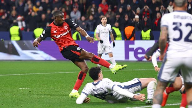 Soccer Football - Champions League - Bayer Leverkusen v Inter Milan - BayArena, Leverkusen, Germany - December 10, 2024 Bayer Leverkusen's Nordi Mukiele scores their first goal REUTERS/Thilo Schmuelgen
