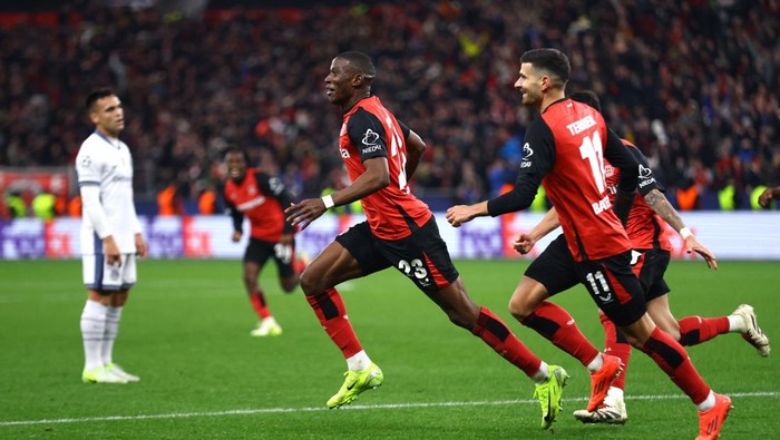 Soccer Football - Champions League - Bayer Leverkusen v Inter Milan - BayArena, Leverkusen, Germany - December 10, 2024 Bayer Leverkusens Nordi Mukiele celebrates scoring their first goal REUTERS/Thilo Schmuelgen