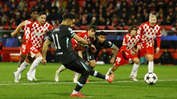 Soccer Football - Champions League - Girona v Liverpool - Estadi Montilivi, Girona, Spain - December 10, 2024 Liverpool's Mohamed Salah scores their first goal from the penalty spot REUTERS/Albert Gea