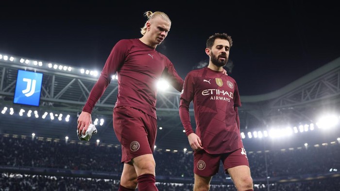 TURIN, ITALY - DECEMBER 11: Erling Haaland and Bernardo Silva of Manchester City appear dejected at the end of the UEFA Champions League 2024/25 League Phase MD6 match between Juventus and Manchester City at Juventus Stadium on December 11, 2024 in Turin, Italy. (Photo by Francesco Scaccianoce - UEFA/UEFA via Getty Images)