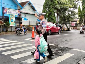 Polres Batu Intensifkan Kegiatan Poros Pagi di 31 Titik Rawan Macet