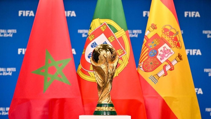 ZURICH, SWITZERLAND - DECEMBER 11: A view of the FIFA World Cup Winners Trophy with the flags of the FIFA World Cup 2030 hosts Morocco, Portugal and Spain during a trophy shoot at the Home of FIFA on December 11, 2024 in Zurich, Switzerland. (Photo by Harold Cunningham - FIFA/FIFA via Getty Images)