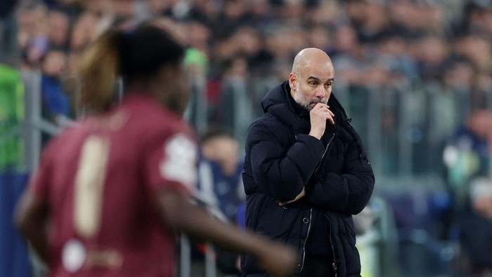 Soccer Football - Champions League - Juventus v Manchester City - Allianz Stadium, Turin, Italy - December 11, 2024 Manchester City manager Pep Guardiola reacts REUTERS/Claudia Greco