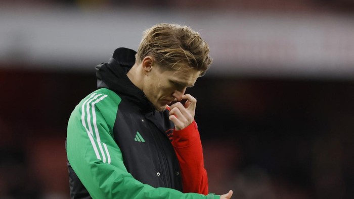 Soccer Football - Premier League - Arsenal v Everton - Emirates Stadium, London, Britain - December 14, 2024 Arsenals Martin Odegaard looks dejected after the match Action Images via Reuters/Andrew Couldridge EDITORIAL USE ONLY. NO USE WITH UNAUTHORIZED AUDIO, VIDEO, DATA, FIXTURE LISTS, CLUB/LEAGUE LOGOS OR LIVE SERVICES. ONLINE IN-MATCH USE LIMITED TO 120 IMAGES, NO VIDEO EMULATION. NO USE IN BETTING, GAMES OR SINGLE CLUB/LEAGUE/PLAYER PUBLICATIONS. PLEASE CONTACT YOUR ACCOUNT REPRESENTATIVE FOR FURTHER DETAILS..