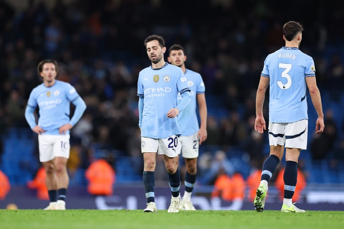 MANCHESTER, ENGLAND - DECEMBER 15: Bernardo Silva of Manchester City looks dejected after the Premier League match between Manchester City FC and Manchester United FC at Etihad Stadium on December 15, 2024 in Manchester, England. (Photo by Alex Livesey - Danehouse/Getty Images)