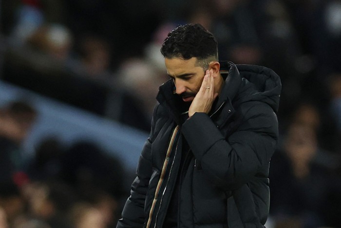 Ruben Amorim Soccer Football - Premier League - Manchester City v Manchester United - Etihad Stadium, Manchester, Britain - December 15, 2024 Manchester United manager Ruben Amorim looks dejected after Manchester City's Josko Gvardiol scores their first goal REUTERS/Phil Noble EDITORIAL USE ONLY. NO USE WITH UNAUTHORIZED AUDIO, VIDEO, DATA, FIXTURE LISTS, CLUB/LEAGUE LOGOS OR 'LIVE' SERVICES. ONLINE IN-MATCH USE LIMITED TO 120 IMAGES, NO VIDEO EMULATION. NO USE IN BETTING, GAMES OR SINGLE CLUB/LEAGUE/PLAYER PUBLICATIONS. PLEASE CONTACT YOUR ACCOUNT REPRESENTATIVE FOR FURTHER DETAILS..