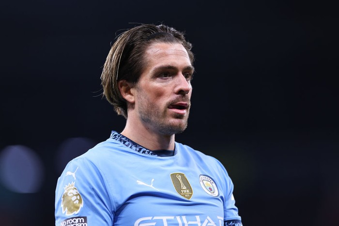 MANCHESTER, ENGLAND - DECEMBER 15:  Jack Grealish of Manchester City during the Premier League match between Manchester City FC and Manchester United FC at Etihad Stadium on December 15, 2024 in Manchester, England. (Photo by Robbie Jay Barratt - AMA/Getty Images)