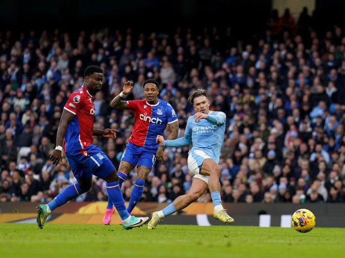Manchester City's Jack Grealish scores the opening goal during the Premier League match at the Etihad Stadium, Manchester. Picture date: Saturday December 16, 2023. (Photo by Martin Rickett/PA Images via Getty Images)