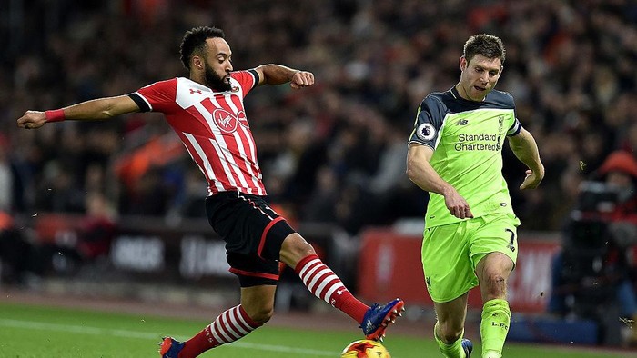SOUTHAMPTON, ENGLAND - JANUARY 11:  (THE SUN OUT, THE SUN ON SUNDAY OUT) James MIlner of Liverpool in action with Nathan Redmond of Southampton during the EFL Cup Semi-Final match between Southampton and Liverpool the at St Marys Stadium on January 11, 2017 in Southampton, England.  (Photo by Andrew Powell/Liverpool FC via Getty Images)