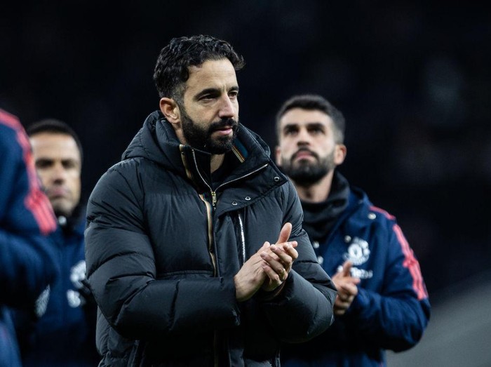 LONDON, ENGLAND - DECEMBER 19: Manchester United's manager Ruben Amorim applauds his side's travelling supporters at the end of the match during the Carabao Cup Quarter Final match between Tottenham Hotspur and Manchester United at Tottenham Hotspur Stadium on December 19, 2024 in London, England. (Photo by Andrew Kearns - CameraSport via Getty Images)