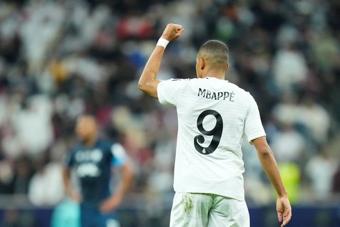 Kylian Mbappe centre-forward of Real Madrid and France celebrates after scoring his sides first goal during the FIFA Intercontinental Cup final match between Real Madrid and C.F. Pachuca at Stadium Lusail Stadium on December 18, 2024 in Doha, Qatar. (Photo by Jose Breton/Pics Action/NurPhoto via Getty Images)