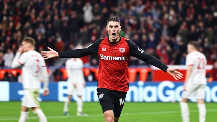 LEVERKUSEN, GERMANY - DECEMBER 21: Patrik Schick of Bayer 04 Leverkusen celebrates scoring his teams second goal  during the Bundesliga match between Bayer 04 Leverkusen and Sport-Club Freiburg at BayArena on December 21, 2024 in Leverkusen, Germany. (Photo by Christof Koepsel/Getty Images)