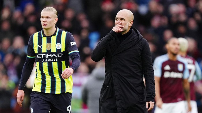 Manchester City manager Pep Guardiola (right) and Erling Haaland after the Premier League match at Villa Park, Birmingham. Picture date: Saturday December 21, 2024. (Photo by Mike Egerton/PA Images via Getty Images)