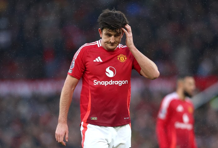 MANCHESTER, ENGLAND - DECEMBER 22: Harry Maguire of Manchester United reacts during the Premier League match between Manchester United FC and AFC Bournemouth at Old Trafford on December 22, 2024 in Manchester, England. (Photo by Nathan Stirk/Getty Images)