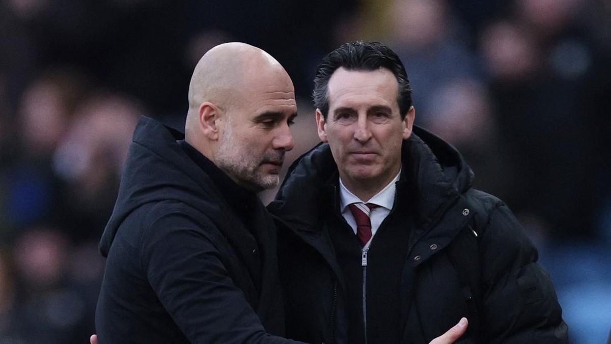 Pep Guardiola beri selamat atas kemenangan Aston Villa (REUTERS/Hannah McKay)