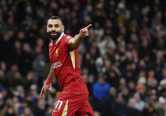 LONDON, ENGLAND - DECEMBER 22: Mohamed Salah of Liverpool celebrates after scoring a goal to make it 1-5 during the Premier League match between Tottenham Hotspur FC and Liverpool FC at Tottenham Hotspur Stadium on December 22, 2024 in London, England. (Photo by Catherine Ivill - AMA/Getty Images)