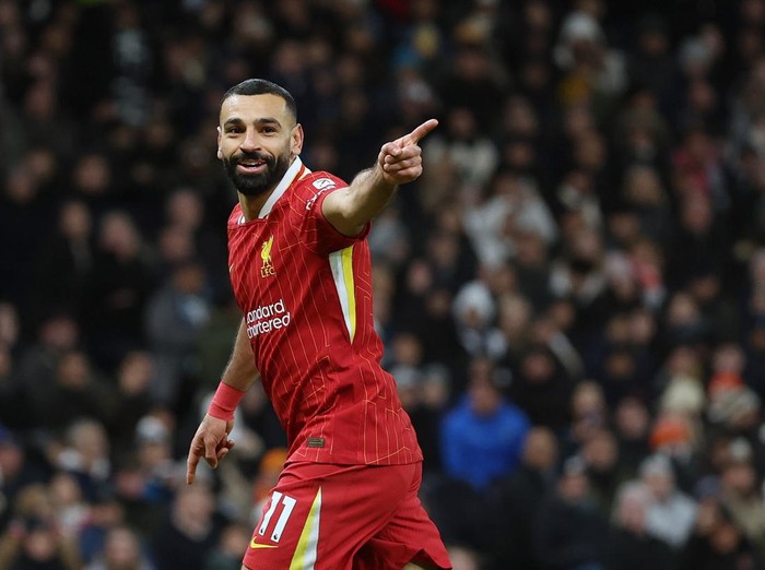LONDON, ENGLAND - DECEMBER 22: Mohamed Salah of Liverpool celebrates after scoring a goal to make it 1-5 during the Premier League match between Tottenham Hotspur FC and Liverpool FC at Tottenham Hotspur Stadium on December 22, 2024 in London, England. (Photo by Catherine Ivill - AMA/Getty Images)