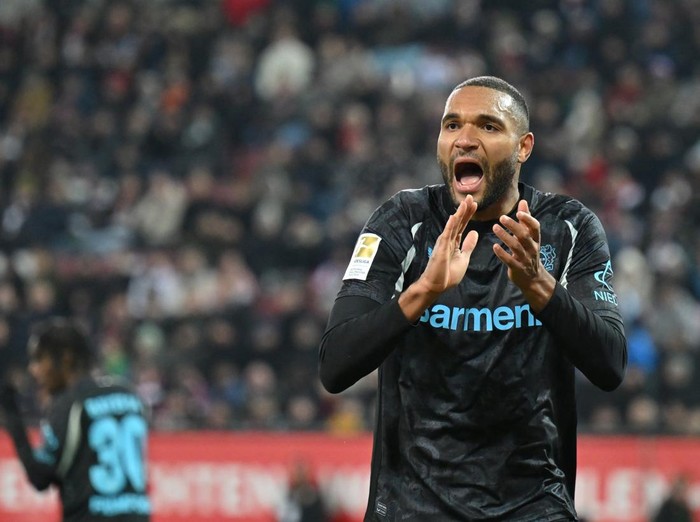 AUGSBURG, GERMANY - DECEMBER 14: Jonathan Tah of Bayer 04 Leverkusen reacts during the Bundesliga match between FC Augsburg and Bayer 04 Leverkusen at WWK-Arena on December 14, 2024 in Augsburg, Germany. (Photo by Sebastian Widmann/Getty Images)