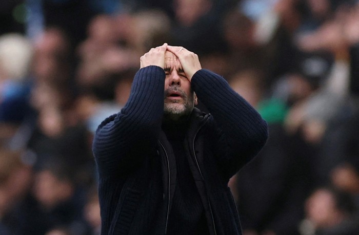 Soccer Football - Premier League - Manchester City v Everton - Etihad Stadium, Manchester, Britain - December 26, 2024 Manchester City manager Pep Guardiola reacts REUTERS/Phil Noble EDITORIAL USE ONLY. NO USE WITH UNAUTHORIZED AUDIO, VIDEO, DATA, FIXTURE LISTS, CLUB/LEAGUE LOGOS OR LIVE SERVICES. ONLINE IN-MATCH USE LIMITED TO 120 IMAGES, NO VIDEO EMULATION. NO USE IN BETTING, GAMES OR SINGLE CLUB/LEAGUE/PLAYER PUBLICATIONS. PLEASE CONTACT YOUR ACCOUNT REPRESENTATIVE FOR FURTHER DETAILS..     TPX IMAGES OF THE DAY