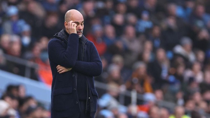 MANCHESTER, ENGLAND - DECEMBER 26: Pep Guardiola manager of Manchester City reacts during the Premier League match between Manchester City FC and Everton FC at Etihad Stadium on December 26, 2024 in Manchester, England. (Photo by Robbie Jay Barratt - AMA/Getty Images)