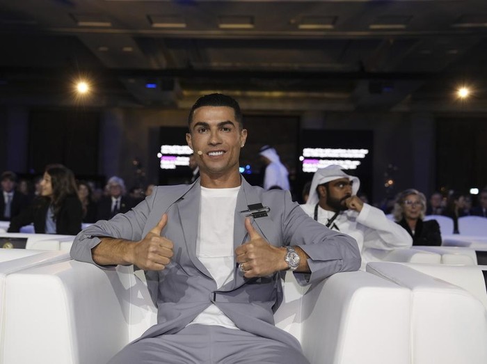 Al Nassr's Cristiano Ronaldo  gestures, during the Globe Soccer Awards 2025, in Dubai, UAE, Friday, Dec. 27, 2024. (abio Ferrari/LaPresse via AP)