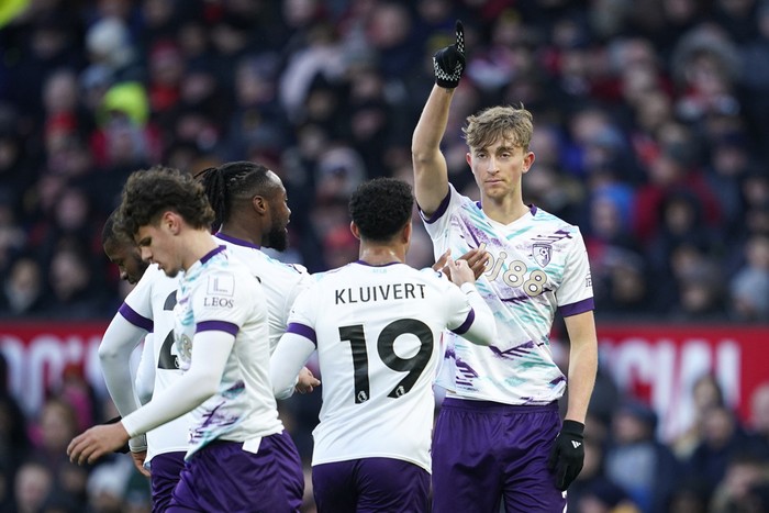 Bournemouths Dean Huijsen celebrates after scoring his sides first goal during the English Premier League soccer match between Manchester United and Bournemouth at the Old Trafford stadium in Manchester, England, Sunday, Dec. 22, 2024. (AP Photo/Dave Thompson)