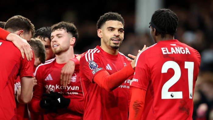 LIVERPOOL, ENGLAND - DECEMBER 29: Morgan Gibbs-White of Nottingham Forest celebrates scoring his teams second goal with teammate Anthony Elanga during the Premier League match between Everton FC and Nottingham Forest FC at Goodison Park on December 29, 2024 in Liverpool, England. (Photo by Alex Livesey/Getty Images)
