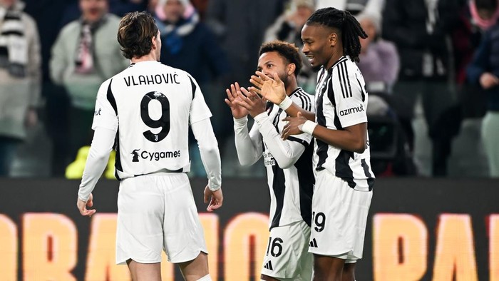 TURIN, ITALY - DECEMBER 29: Khephren Thuram of Juventus celebrates after scoring his teams second goal with teammates Weston McKennie and Dusan Vlahovic during the Serie A match between Juventus and Fiorentina at Allianz Stadium on December 29, 2024 in Turin, Italy. (Photo by Daniele Badolato - Juventus FC/Juventus FC via Getty Images)
