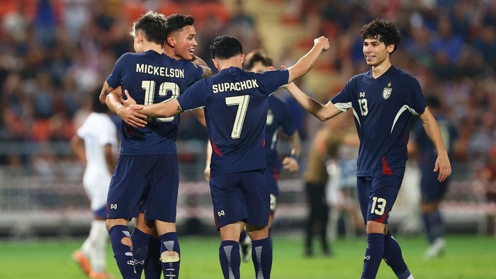 BANGKOK, THAILAND - DECEMBER 30: Patrik Gustavsson of Thailand (2nd L) celebrates after scoring the teams second goal with teammate during the ASEAN Mitsubishi Electric Cup 2024 Semi Final second leg match between Thailand and Philippines at Rajamangala National Stadium on December 30, 2024 in Bangkok, Thailand. (Photo by Pakawich Damrongkiattisak/Getty Images)