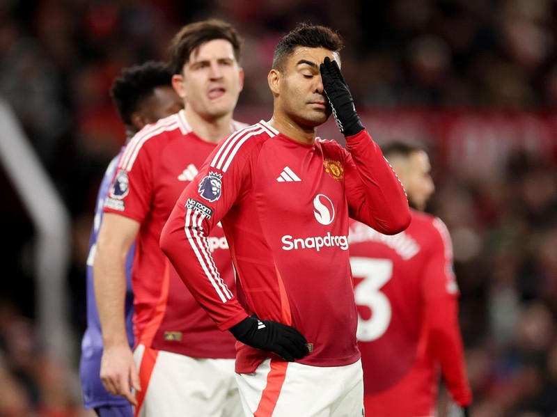 MANCHESTER, ENGLAND - DECEMBER 30: Casemiro of Manchester United looks dejected during the Premier League match between Manchester United FC and Newcastle United FC at Old Trafford on December 30, 2024 in Manchester, England. (Photo by Carl Recine/Getty Images)