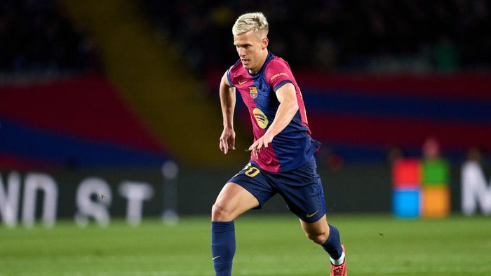 Dani Olmo BARCELONA, SPAIN - DECEMBER 21: Dani Olmo of FC Barcelona runs with the ball during the LaLiga EASports match between FC Barcelona and Atletico de Madrid at Estadi Olimpic Lluis Companys on December 21, 2024 in Barcelona, Spain. (Photo by Alex Caparros/Getty Images)