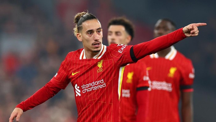 LIVERPOOL, ENGLAND - NOVEMBER 05: Kostas Tsimikas of Liverpool gestures during the UEFA Champions League 2024/25 League Phase MD4 match between Liverpool FC and Bayer 04 Leverkusen at Anfield on November 05, 2024 in Liverpool, England. (Photo by Chris Brunskill/Fantasista/Getty Images)