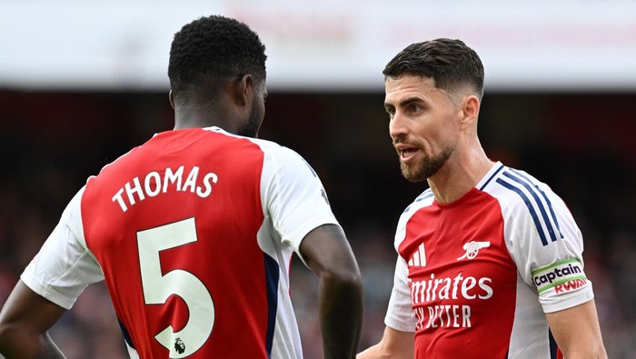 LONDON, ENGLAND - OCTOBER 05: Jorginho chats to Thomas Partey of Arsenal during the Premier League match between Arsenal FC and Southampton FC at Emirates Stadium on October 05, 2024 in London, England. (Photo by David Price/Arsenal FC via Getty Images)