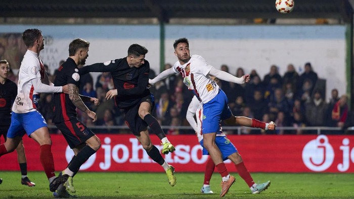 BARBASTRO, SPAIN - JANUARY 04: Robert Lewandowski of FC Barcelona scores after this action his teams second goal during the Copa del Rey Round of 32 match between FC Barcelona and UD Barbastro at Campo Municipal de Deportes on January 04, 2025 in Barbastro, Spain. (Photo by Pedro Salado/Getty Images)