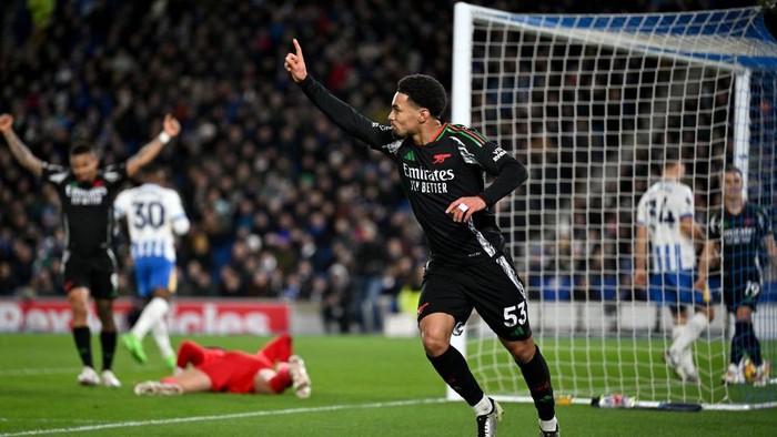 BRIGHTON, ENGLAND - JANUARY 04: Ethan Nwaneri of Arsenal celebrates scoring his teams first goal during the Premier League match between Brighton & Hove Albion FC and Arsenal FC at Amex Stadium on January 04, 2025 in Brighton, England. (Photo by David Price/Arsenal FC via Getty Images)