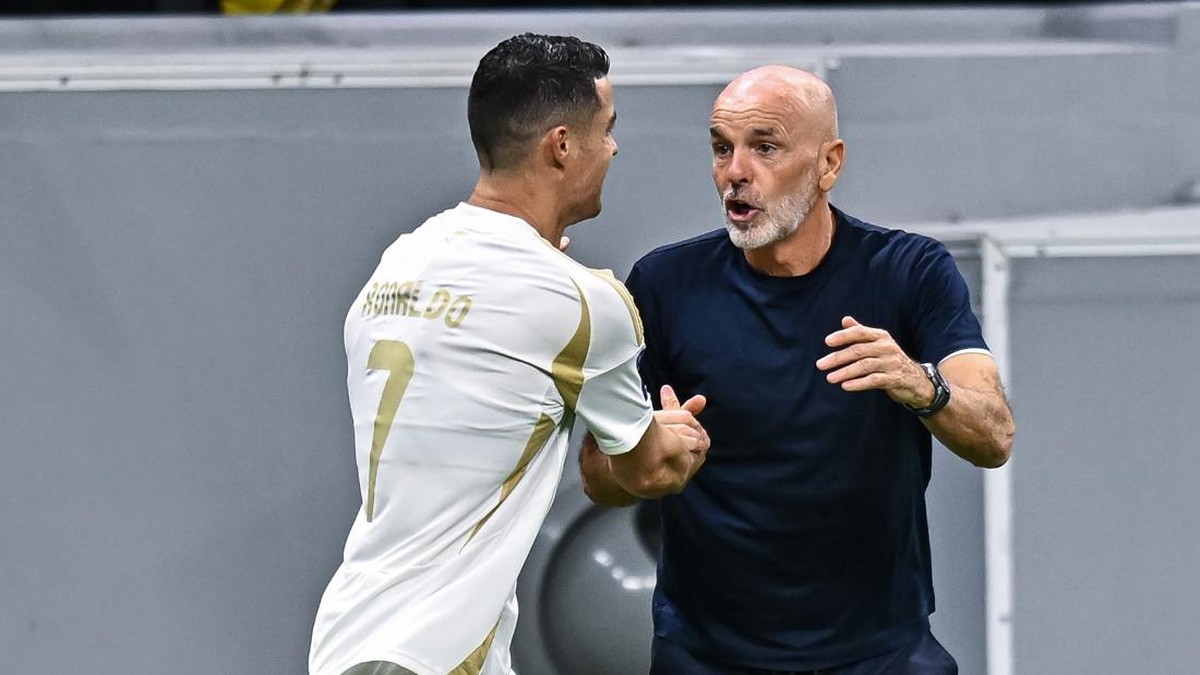 Stefano Pioli dan Cristiano Ronaldo. (Foto: NurPhoto via Getty Images/NurPhoto)