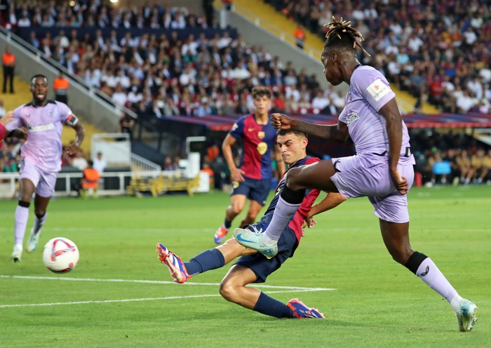 Nico Williams and Pedri play during the match between FC Barcelona and Athletic Club de Bilbao, corresponding to week 2 of LaLiga EA Sports, at the Lluis Companys Stadium in Barcelona, Spain, on August 24, 2024. (Photo by Joan Valls/Urbanandsport/NurPhoto via Getty Images)