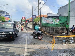 Sampah di Depo Jalan Pulau Kawe Meluber ke Jalan, Arus Lalin Sempat Tersendat Sampah di Depo Jalan Pulau Kawe Meluber ke Jalan, Arus Lalin Sempat Tersendat