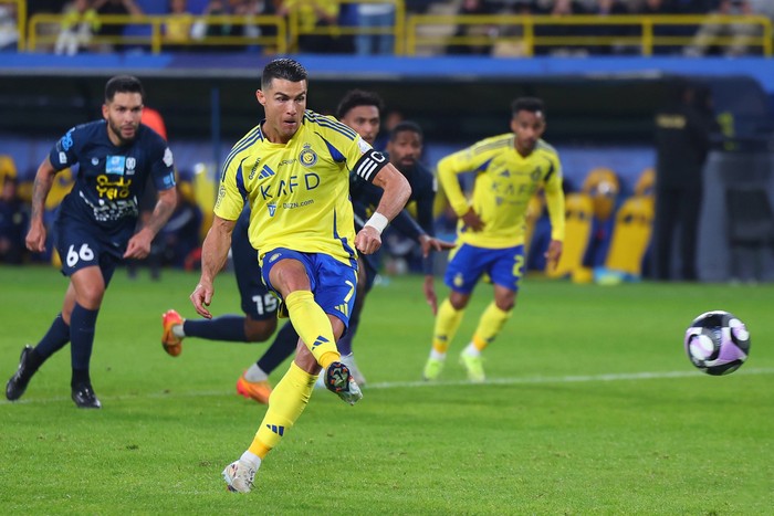 Cristiano Ronaldo RIYADH, SAUDI ARABIA - JANUARY 09: Cristiano Ronaldo of Al-Nassr takes a penalty during the Saudi Pro League football match between Al-Nassr and Al-Okhdood at Al-Awwal Park in Riyadh on January 09, 2025 in Riyadh, Saudi Arabia. (Photo by Al Nassr FC/Al Nassr FC via Getty Images)