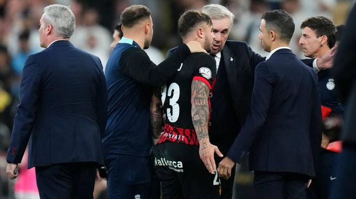 Carlo Ancelotti head coach of Real Madrid and talks with Pablo Maffeo right-back of Mallorca and Argentina after the Spanish Super Cup semi-final match between Real Madrid and RCD Mallorca at King Abdullah Sports City on January 9, 2025 in Jeddah, Saudi Arabia. (Photo by Jose Breton/Pics Action/NurPhoto via Getty Images)