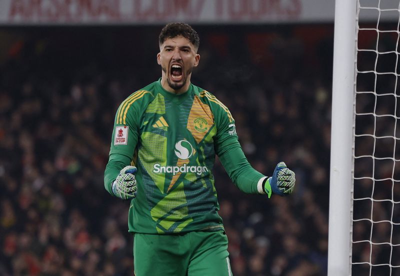 Soccer Football - FA Cup - Third Round - Arsenal v Manchester United - Emirates Stadium, London, Britain - January 12, 2025 Manchester United's Altay Bayindir celebrates after he saves a penalty from Arsenal's Kai Havertz during the shoot-out Action Images via Reuters/Andrew Couldridge