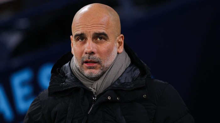 MANCHESTER, ENGLAND - JANUARY 11: Josep Pep Guardiola, manager of Manchester City,  during the Emirates FA Cup Third Round match between Manchester City and Salford City at Etihad Stadium on January 11, 2025 in Manchester, England. (Photo by James Gill - Danehouse/Getty Images)