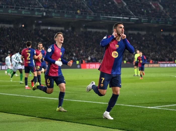 BARCELONA, SPAIN - JANUARY 15: Ferran Torres of FC Barcelona celebrates scoring his team's fourth goal during the Copa del Rey Round of 16 match between FC Barcelona and Real Betis at Estadi Olimpic Lluis Companys on January 15, 2025 in Barcelona, Spain. (Photo by David Ramos/Getty Images)