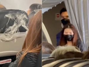 Diam, Tenang... dan Perempuan Ini Malah Nge-vape di Pesawat Diam, Tenang... dan Perempuan Ini Malah Nge-vape di Pesawat